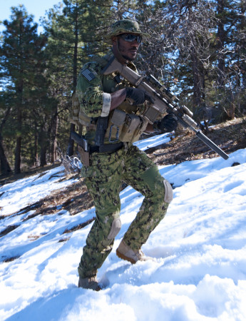 A Navy SEAL in training. Note the Sig P226 Mk25 in the holster (photo by SEALs).