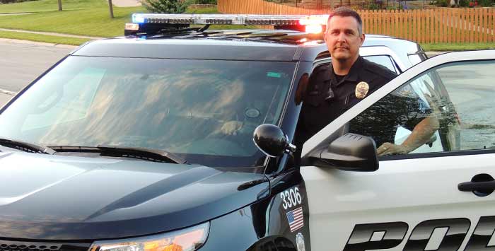 Police Officer In Car