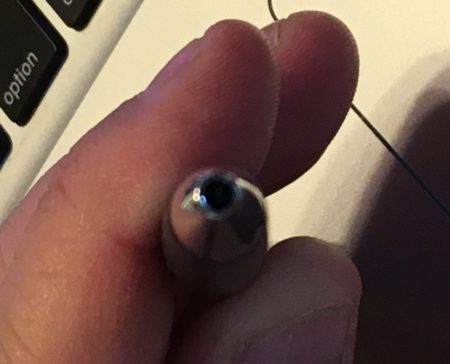 The end of a ball point pen, including the edges, is approximately the low end of a "normal" pupil size.