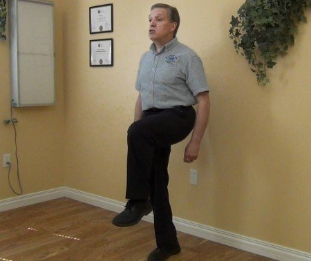 This does not require nearly as much balance as extending the raised leg straight outward (photo from YouTube).