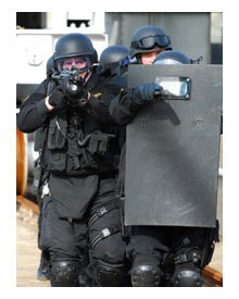 Some dangerous situations require heavy vests, shields and rifles. So explain that.