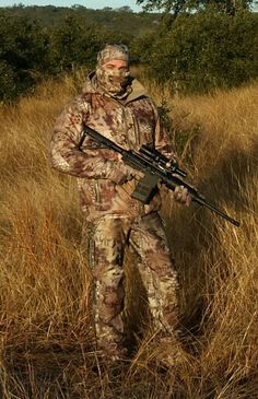 Photo of a hunter using a similar 1-4x24 scope. Photo from Pinterest