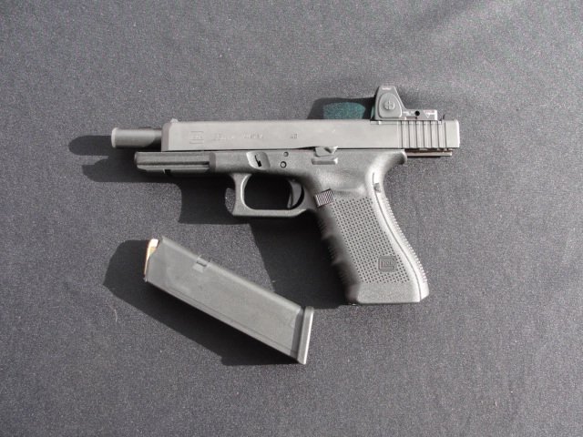 A new Glock MOS pistol. Note the attachment plate sitting in the machined slot at the rear of the slide.