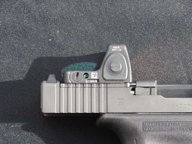 The MOS sight slot does get very close to the extractor, but Glock assures the structural integrity of the slide will remain intact.