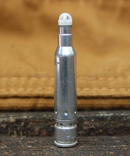 A close-up of the UTM 5.56mm RBT round, and their patented crucifix dome.