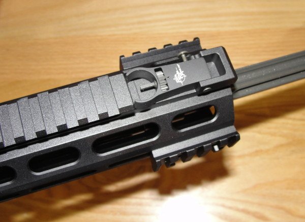 The IRS octagonal hand guard. Here the front sight is folded flush, and (2) small Picatinny attachments have been added.