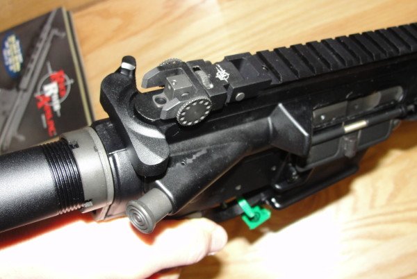 Here the RRA IRS rear sight is folded down flush to the rail.