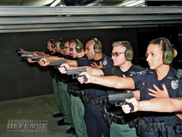 A line of Mariett, GA Police Officers firing their new Glock 42 back-up pistols. (Photo by Personal Defense World).