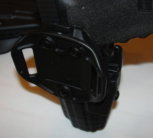 The GLS standard belt loop backing, with a Glock.