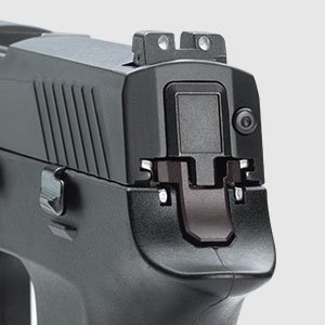 The rear Sig night sights, and a view of the striker fired conversion.