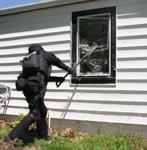 Breaching windows is another specialized skill set of SWAT teams (Author in training).