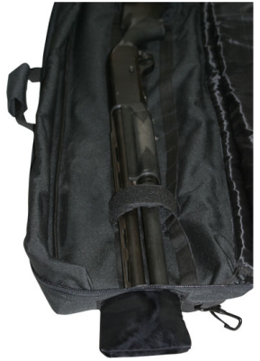 The extendable pouch allows for longer shotguns or AR-15's to be carried and protected.