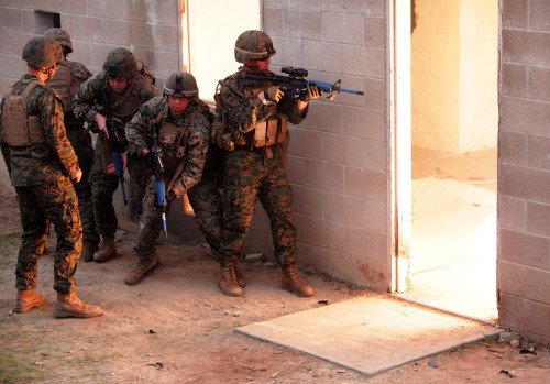 U.S. Marines training with flash bangs (photo by imef.marines.mil).