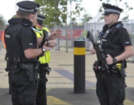 Scottish Police armed with Glock sidearms and HK UMP sub-machine guns.