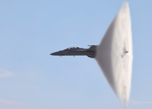 Speed and surprise are fine things, like this F-18 breaking the sound barrier.
