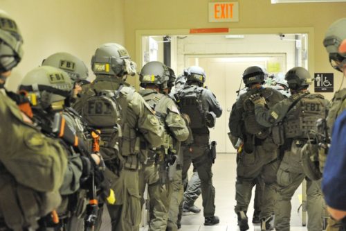 An FBI SWAT Team practices Hall Boss procedures for Active Shooters (photo by fbi.gov).