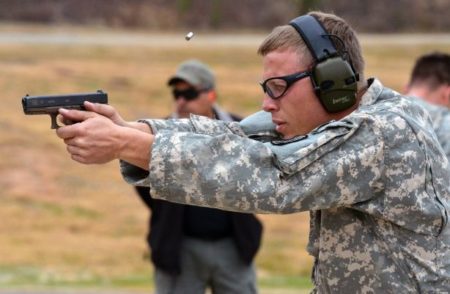 An Army soldier firing a Glock 19 (photo by US Army).