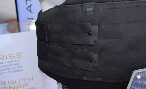 The QuadCore system uses key mod holes and Molle quick attach strap with attachment studs.