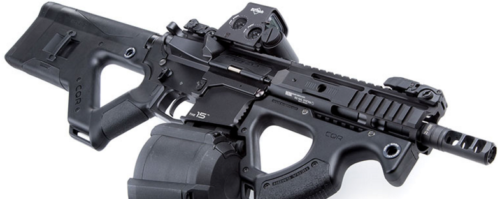 Here an AR-15 has HERA buttstock, foregrip, and an EOTech sight, with Magpul D-60 magazine.