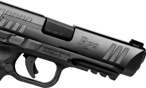 The RP9 has a steel slide with front and rear serrations, and machined labeling.